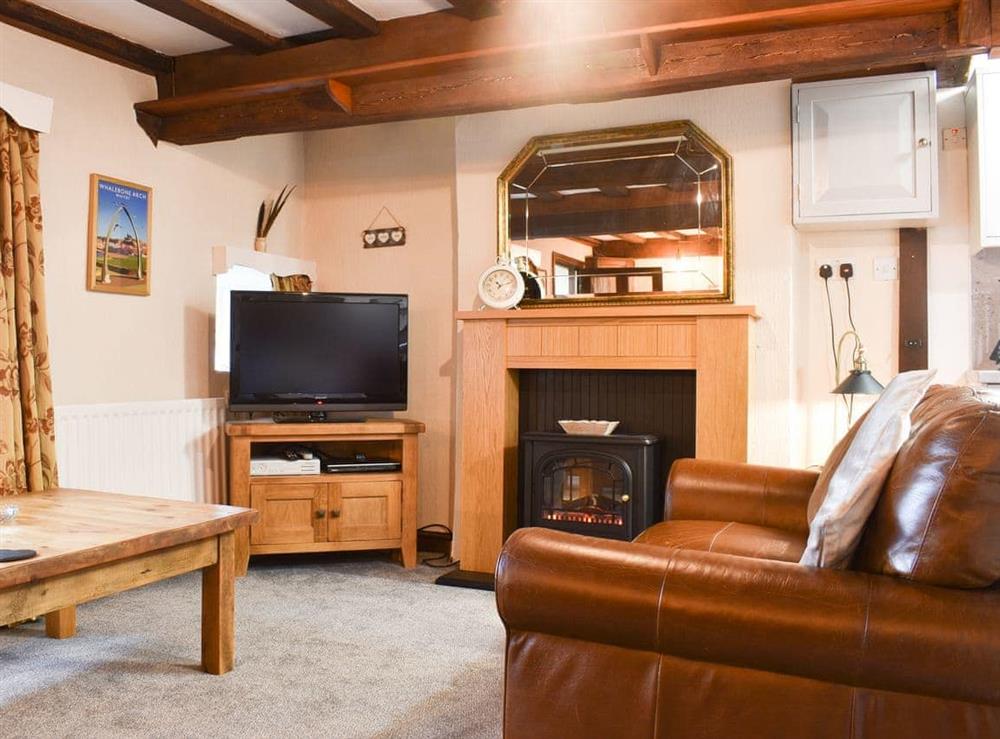Living area at Rose Cottage 2 in Sneaton, near Whitby, North Yorkshire