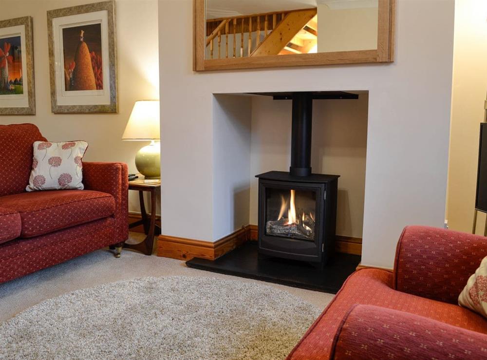 Living room with wood burner (photo 2) at Rose Cottage in Betws-y-Coed, Conwy, Gwynedd