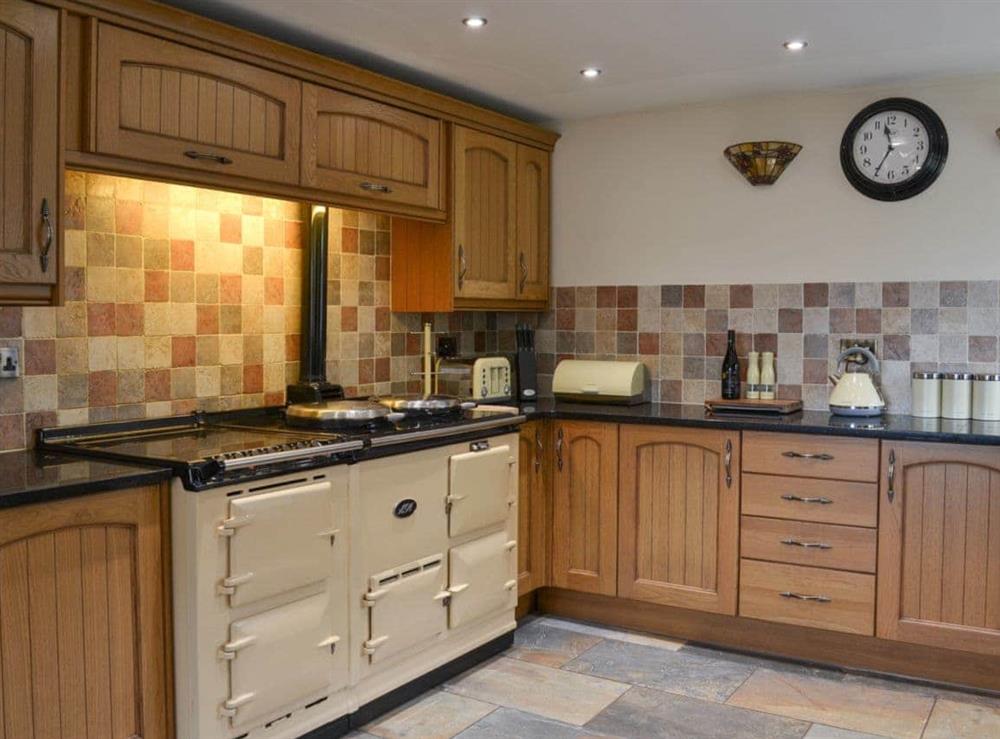Kitchen with large Aga stove at Rose Cottage in Bratoft, near Burgh-le-Marsh, Lincolnshire