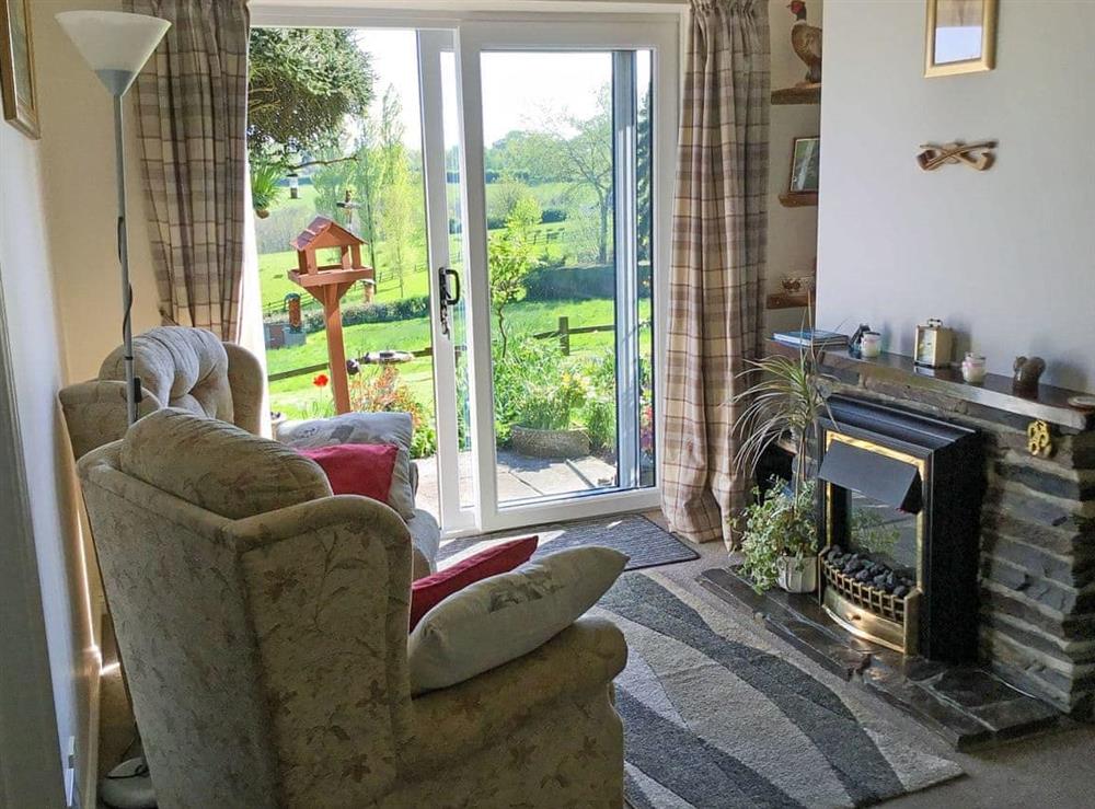 Cosy living room at Rose Cottage in Cheriton Bishop, near Exeter, Devon