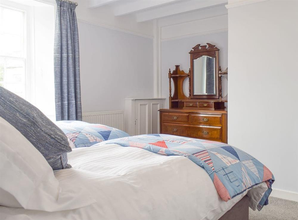Good-sized twin bedroom at Rose Cottage in Fylingthorpe, near Whitby, Yorkshire, North Yorkshire