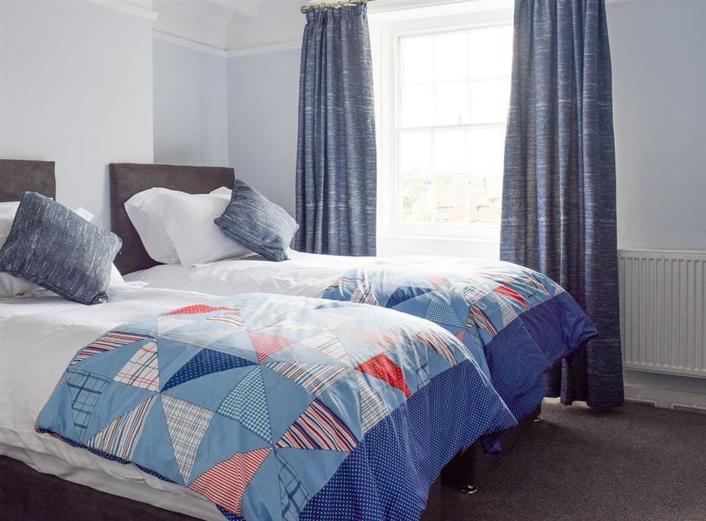 Light and airy twin bedroom at Rose Cottage in Fylingthorpe, near Whitby, Yorkshire, North Yorkshire