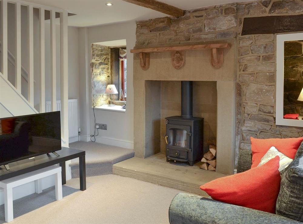 Welcoming living room at Rose Cottage in Grindleford, near Bakewell, Derbyshire