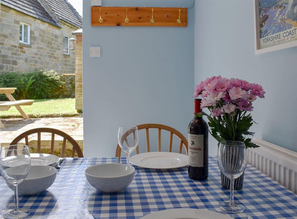 Charming dining area (photo 2) at Rose Cottage in Houlsyke, near Whitby, North Yorkshire