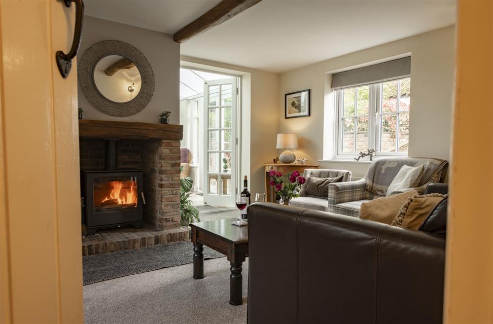 Main sitting room with wood-burning stove