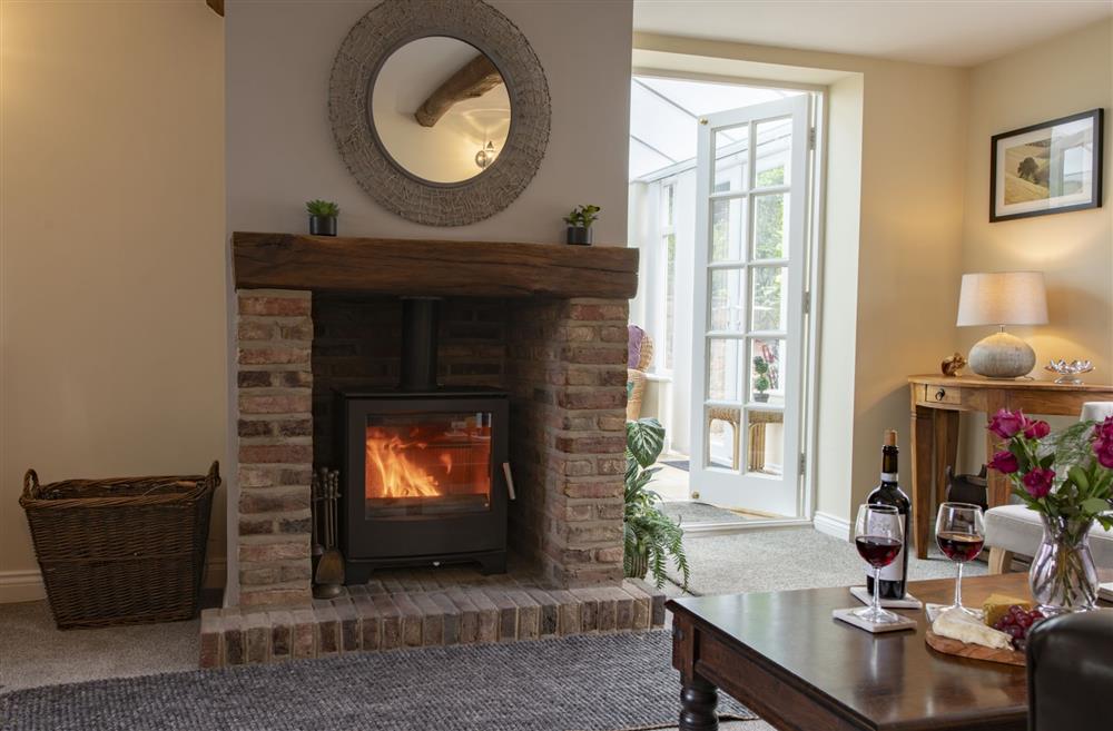 The main sitting room leads into the conservatory