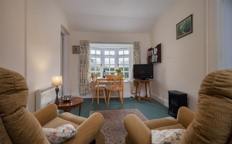 Relax in the living area at Rose Cottage, Minehead