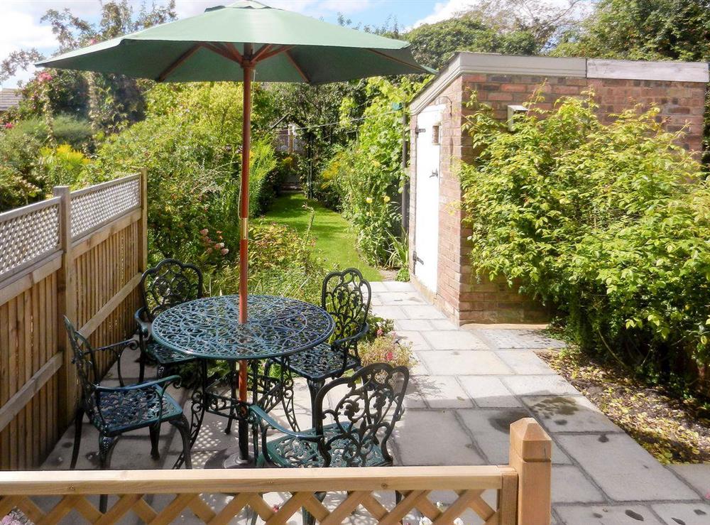 Delightful well established garden with patio area at Rose Cottage in Saffron Walden, Essex