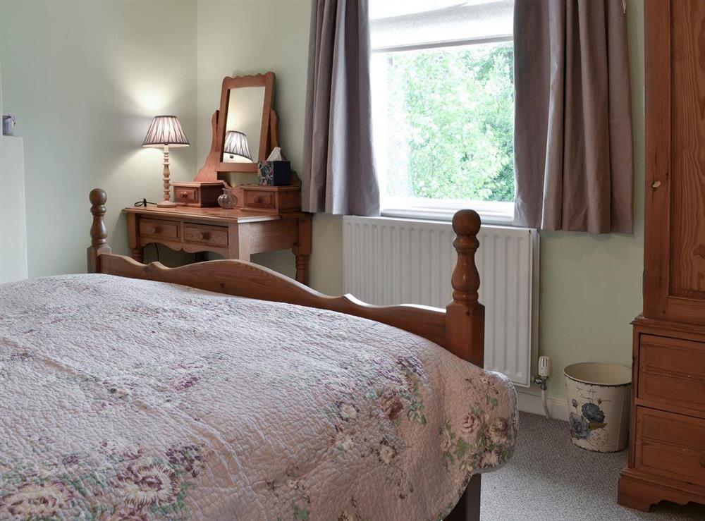 Tastefully furnished bedroom at Rose Cottage in Saffron Walden, Essex