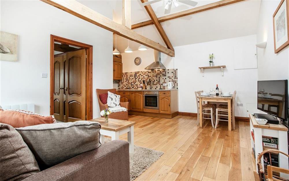 High oak beamed ceilings and oak floors at Rose Cottage in Seaton
