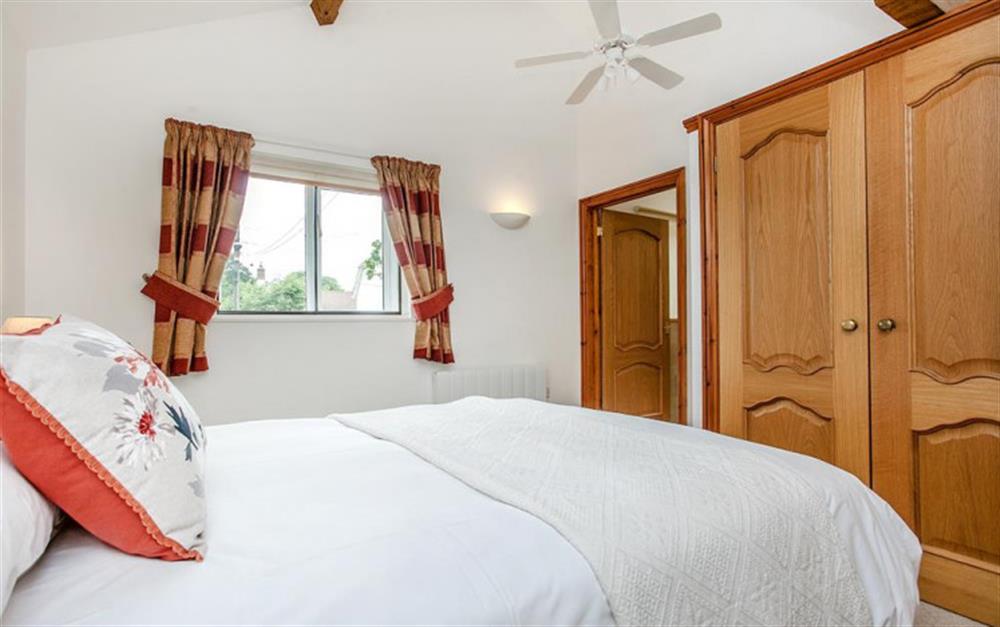 The double bedroom with king size bed at Rose Cottage in Seaton