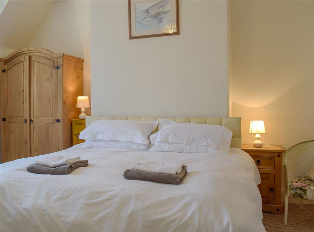 Comfortable double bedroom (can be twin beds) at Rose Cottage in Tenby, Pembrokeshire, Dyfed