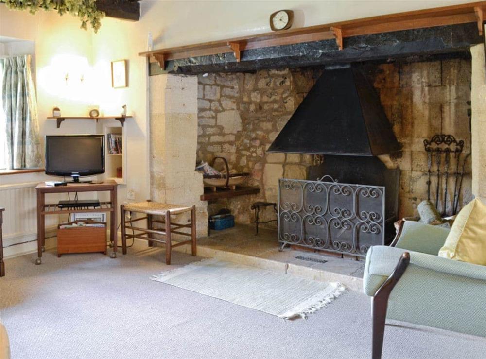 Outstanding heritage fireplace in lounge at Rose Cottage in Westington, Chipping Campden, Glos., Gloucestershire
