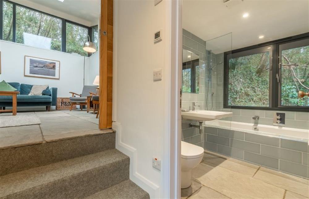 Family bathroom with shower over bath, wash basin and WC at Rose in Vale Cottage, Mithian, St Agnes 