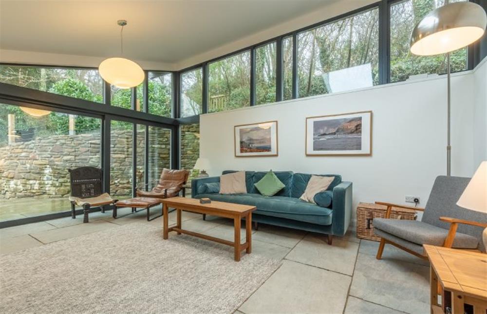 Family room with large sliding doors out into the gardens at Rose in Vale Cottage, Mithian, St Agnes 