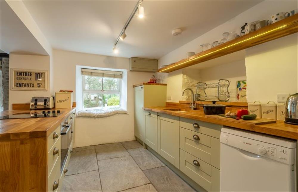 Kitchen with oven, hob, fridge and dishwasher at Rose in Vale Cottage, Mithian, St Agnes 