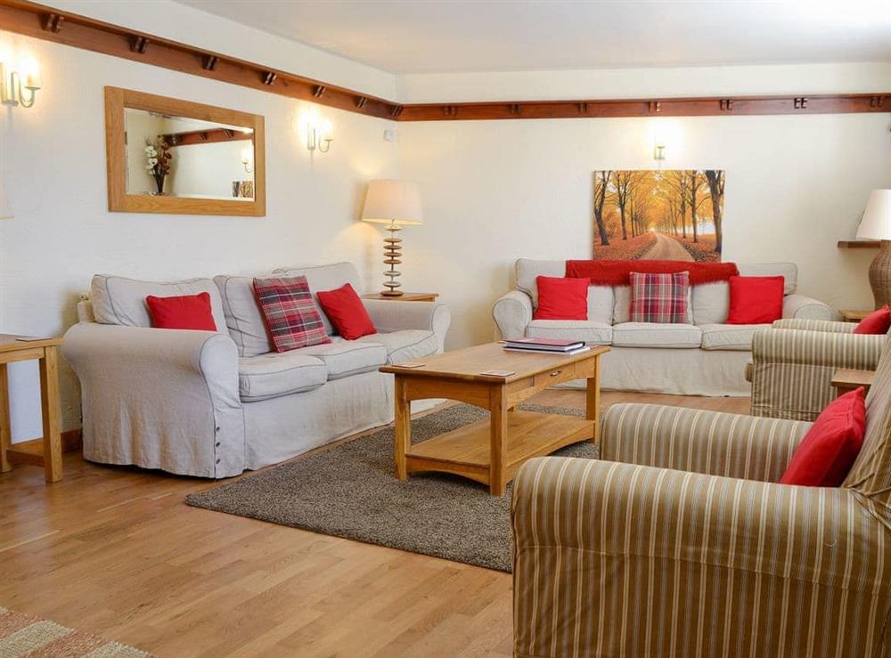 Large, comfortable living room at Rose Patch Cottage in Keswick, Cumbria