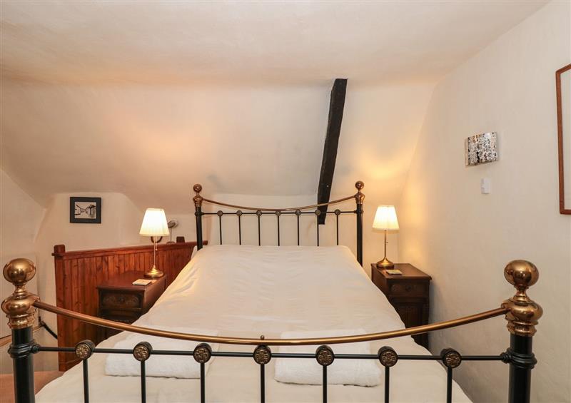 A bedroom in Rose Thatch at Rose Thatch, Malborough