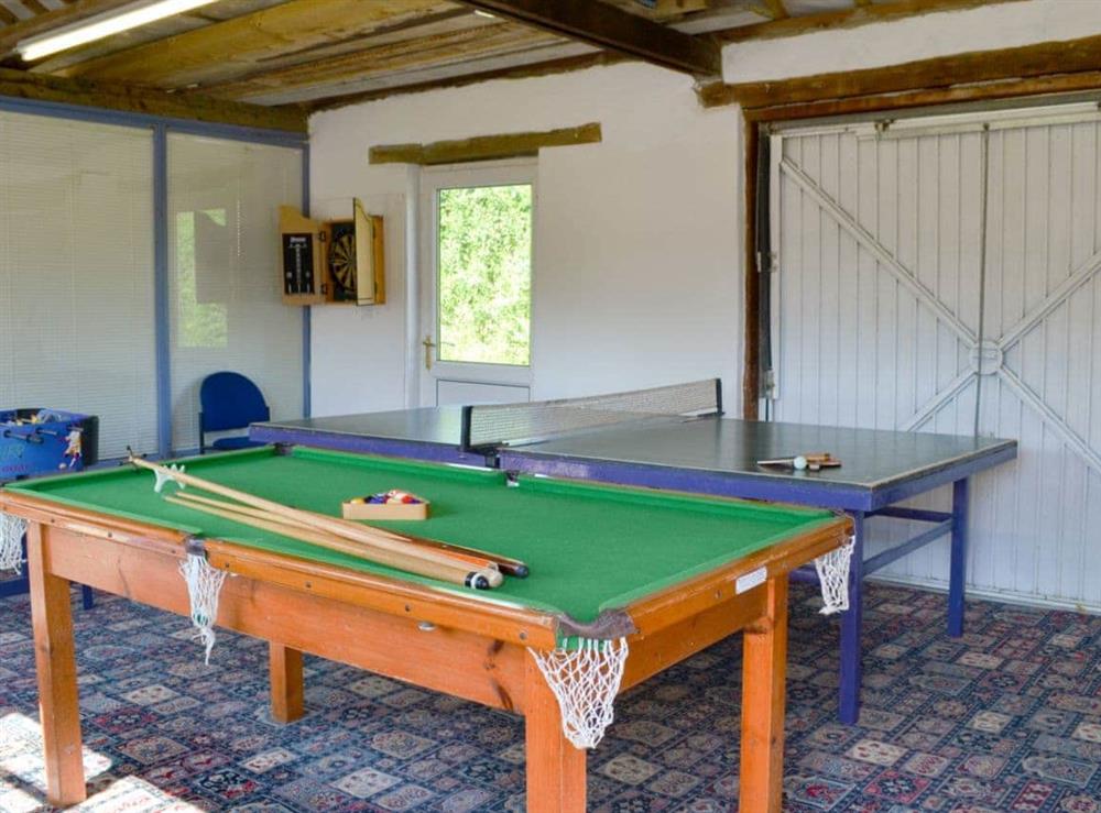 Entertaining games room at Rosebank Cottage in Stowford, Devon/Cornwall border, Great Britain