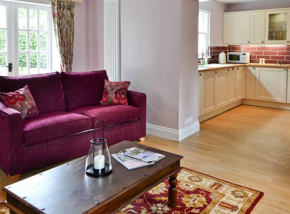 Living room leading to kitchen/diner at Roseburn Cottage in Moffat, Dumfriesshire