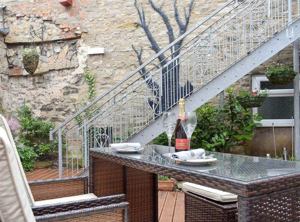 Attractive courtyard with outdoor furniture at Rosedale in Richmond, North Yorkshire