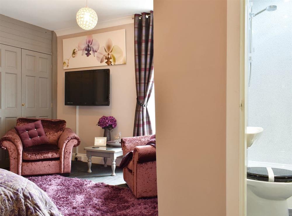 Seating area and en-suite within double bedroom at Rosedale in Richmond, North Yorkshire