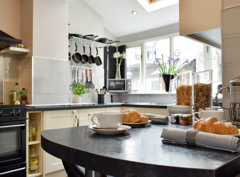 Well-equipped kitchen with breakfast bar at Rosedale in Richmond, North Yorkshire