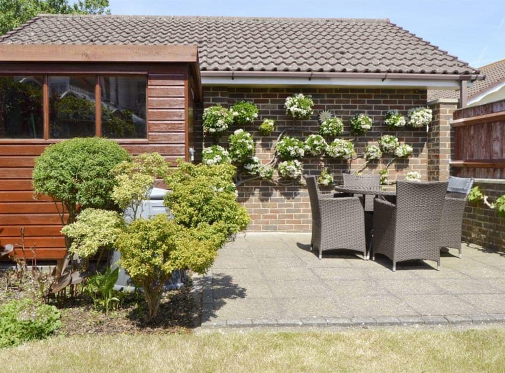 Paved patio with high quality outdoor furniture at Rosedene in Bembridge, Isle Of Wight