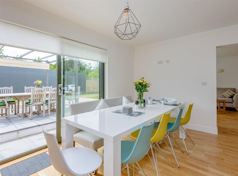 Light and airy dining area at Rosedene in Freshwater, near Totland, Isle of Wight
