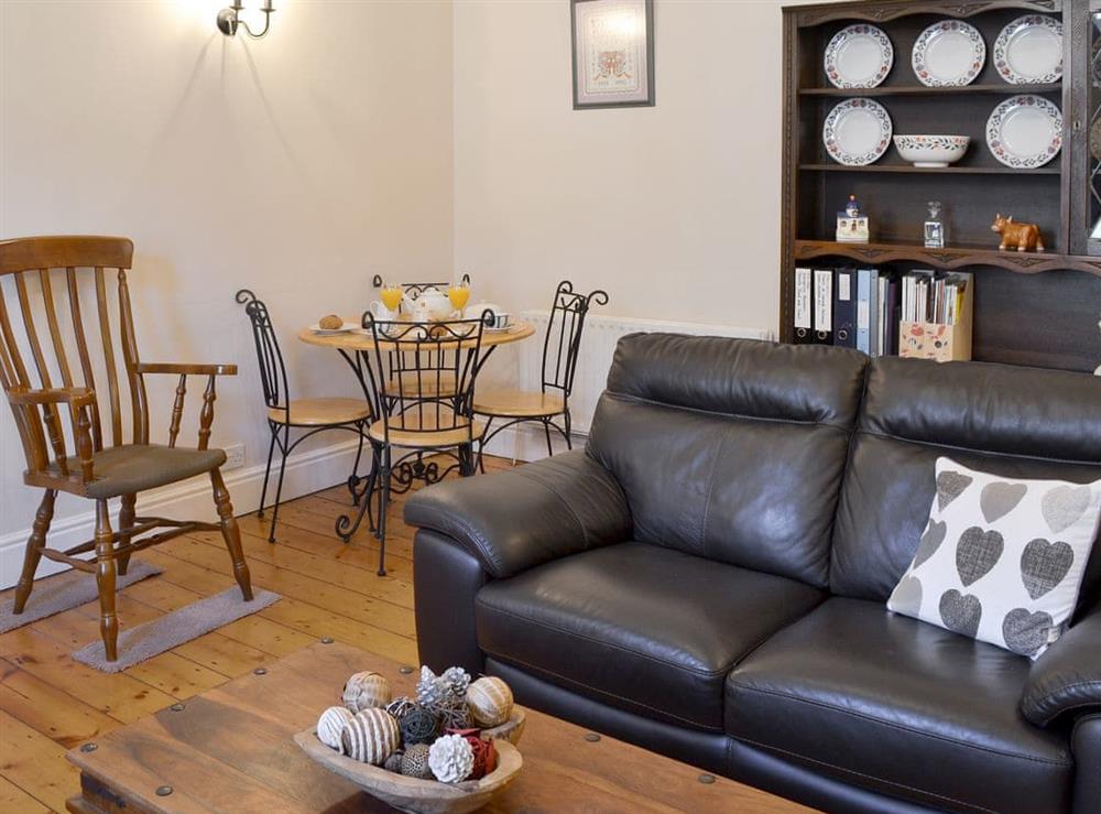 Charming living/ dining room at Rosehip Cottage in Alnwick, Northumberland