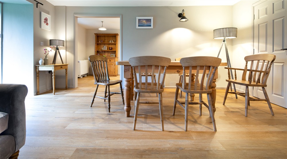 The dining area at Roseland Porth Farm Cottage in Truro, Cornwall