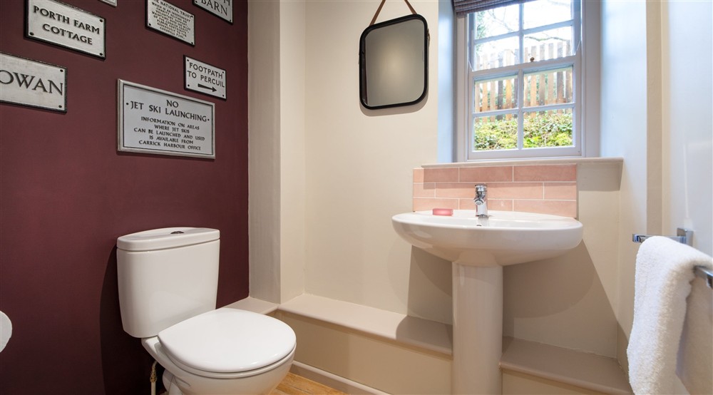 The downstairs WC at Roseland Porth Farm Cottage in Truro, Cornwall