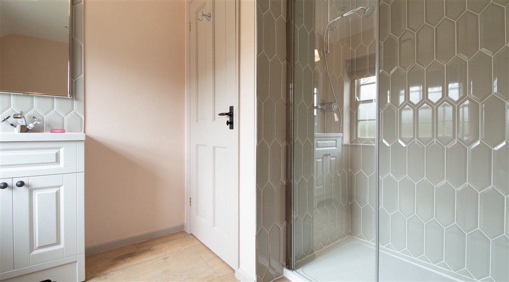 The shower room at Roseland Porth Farm Cottage in Truro, Cornwall