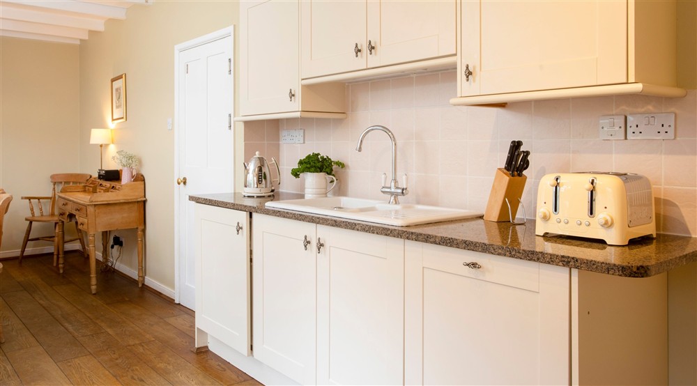 The kitchen and dining room at Roseland Porth Farm House in Roseland, Cornwall