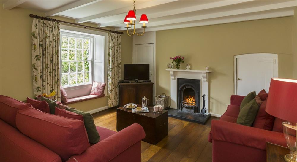 The sitting room at Roseland Porth Farm House in Roseland, Cornwall