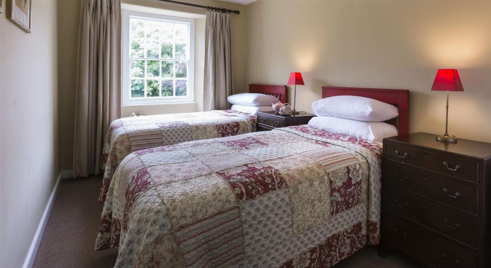 The twin bedroom at Roseland Porth Farm House in Roseland, Cornwall