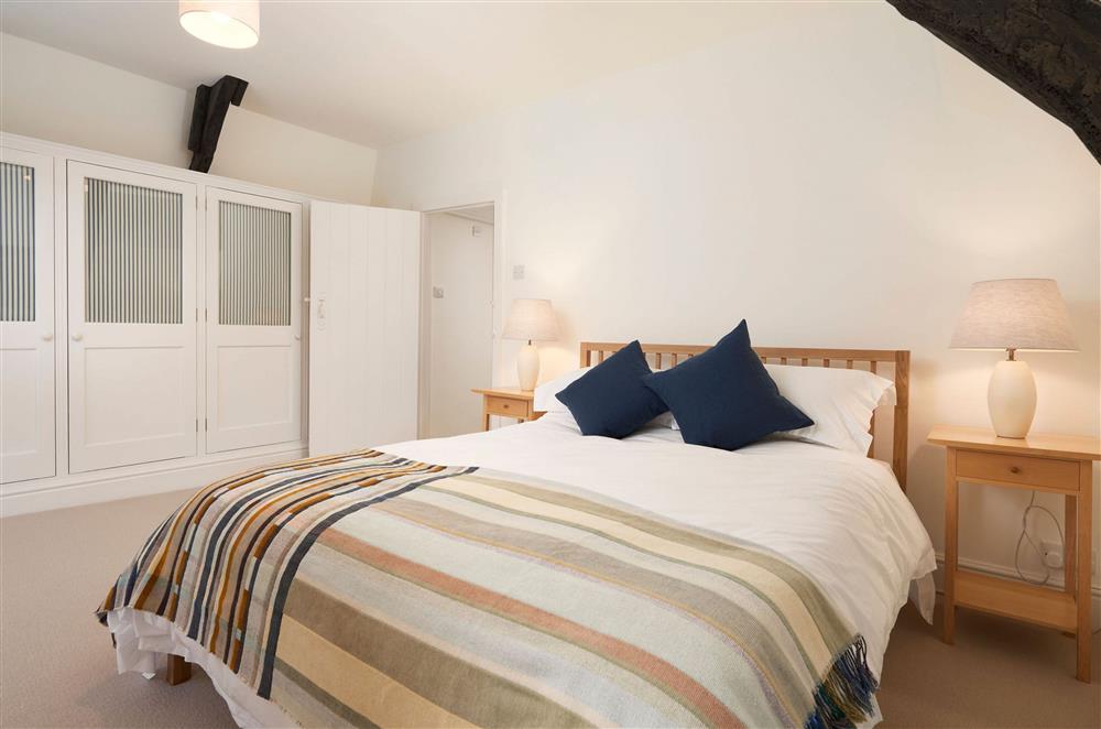 First floor: Bedroom two with 5ft king-size bed at Rosemary Cottage, Dittisham