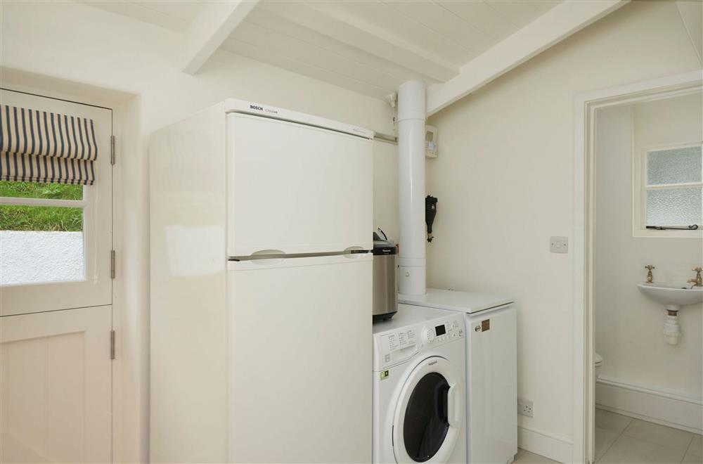 Ground floor: Utility room with washer/dryer, fridge/freezer and cloakroom/WC at Rosemary Cottage, Dittisham
