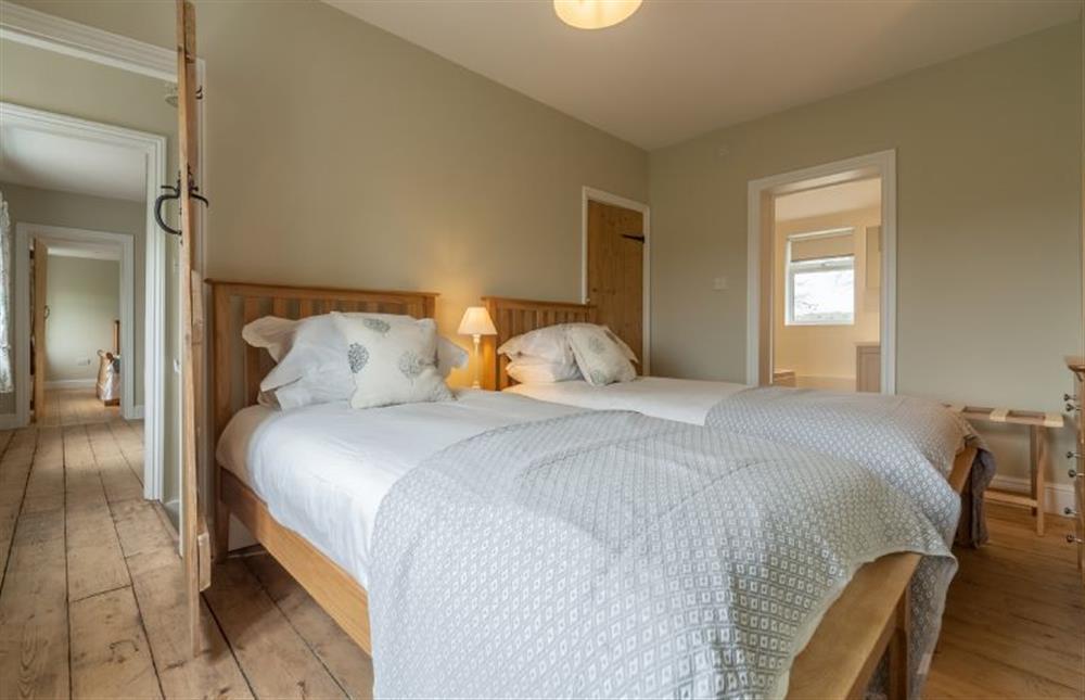 First floor: Bedroom four is a twin room at Rosemary Cottage, Thornham near Hunstanton