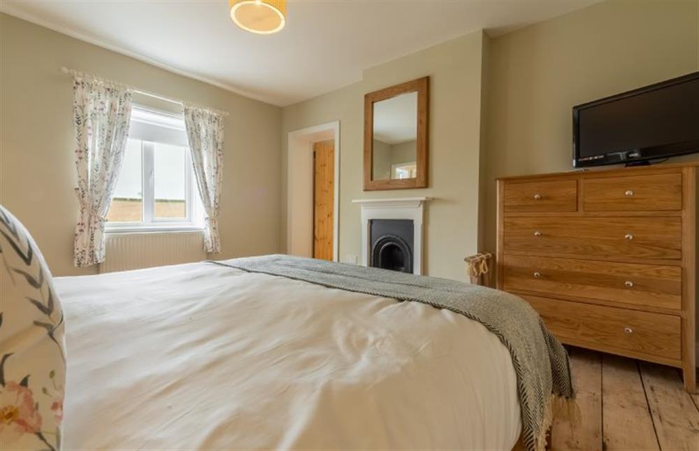 First floor: Bedroom three has jack-and-jill access to bedroom two at Rosemary Cottage, Thornham near Hunstanton