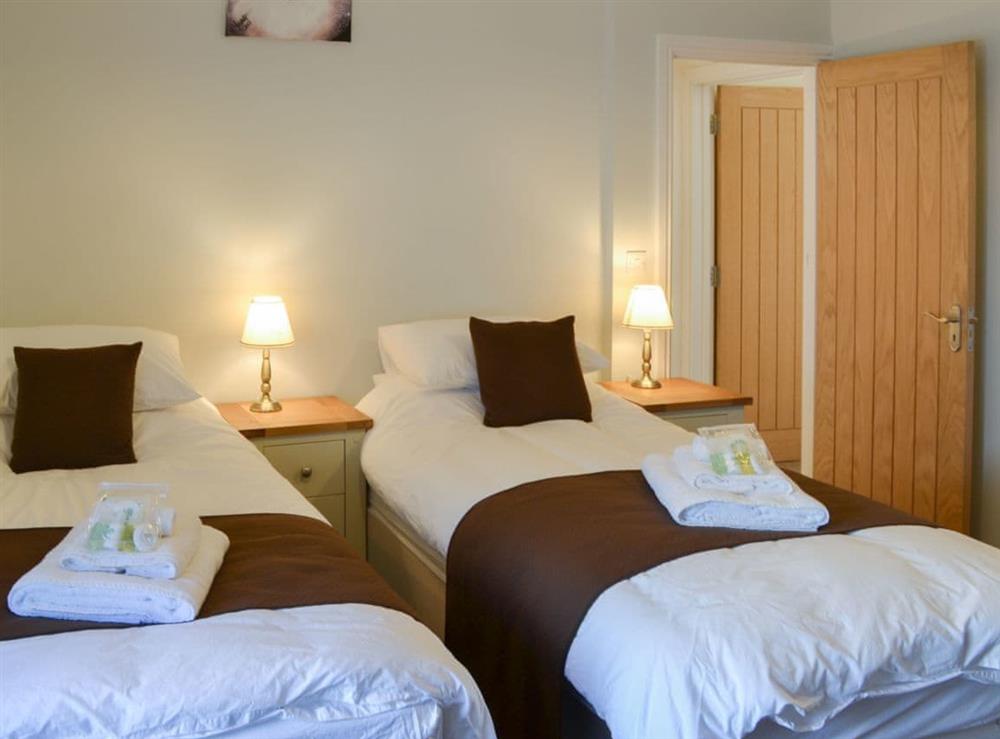Twin bedroom with zip-and-link beds which can convert to a super kingsize at Ocean Mist, 