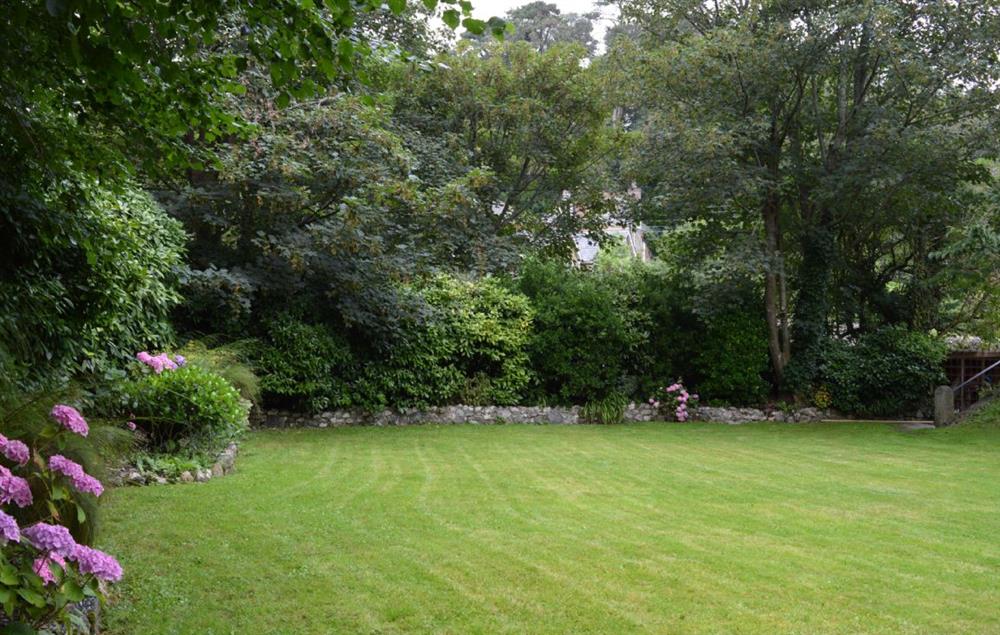 The house is surrounded by a large well stocked garden and two terraces  at Rosevean House, St. Agnes