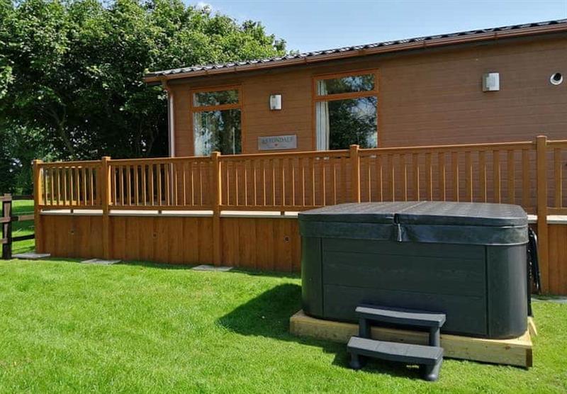 The hot tub outside the Lakeside View VIP at Rosewood Waters in Woodhall Spa, Lincolnshire