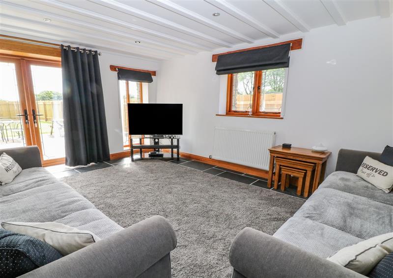 Relax in the living area at Rosies Barn, Woolfardisworthy