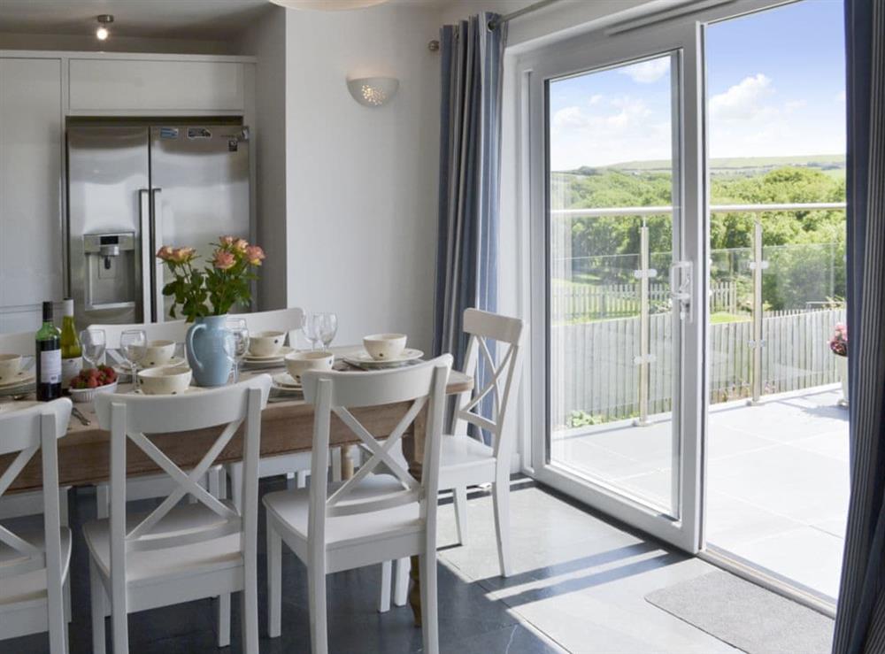 Dining room with spectacular view at Roskear in Crackington Haven, near Bude, Cornwall