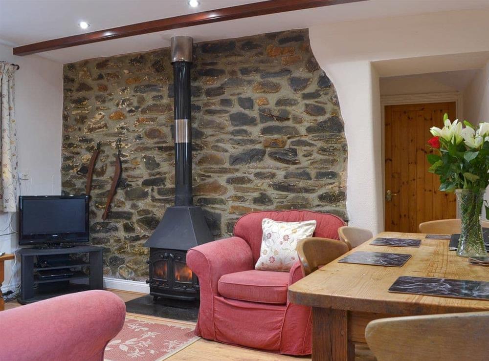 Charming living and dining room at Ross Cottage in Polson, Launceston, Cornwall