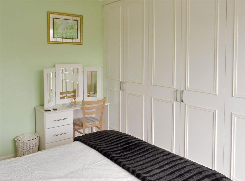 Ample storage and dressing area in double bedroom at Rossall Beach Cottage in Rossall, near Thornton-Cleveleys, Lancashire, England