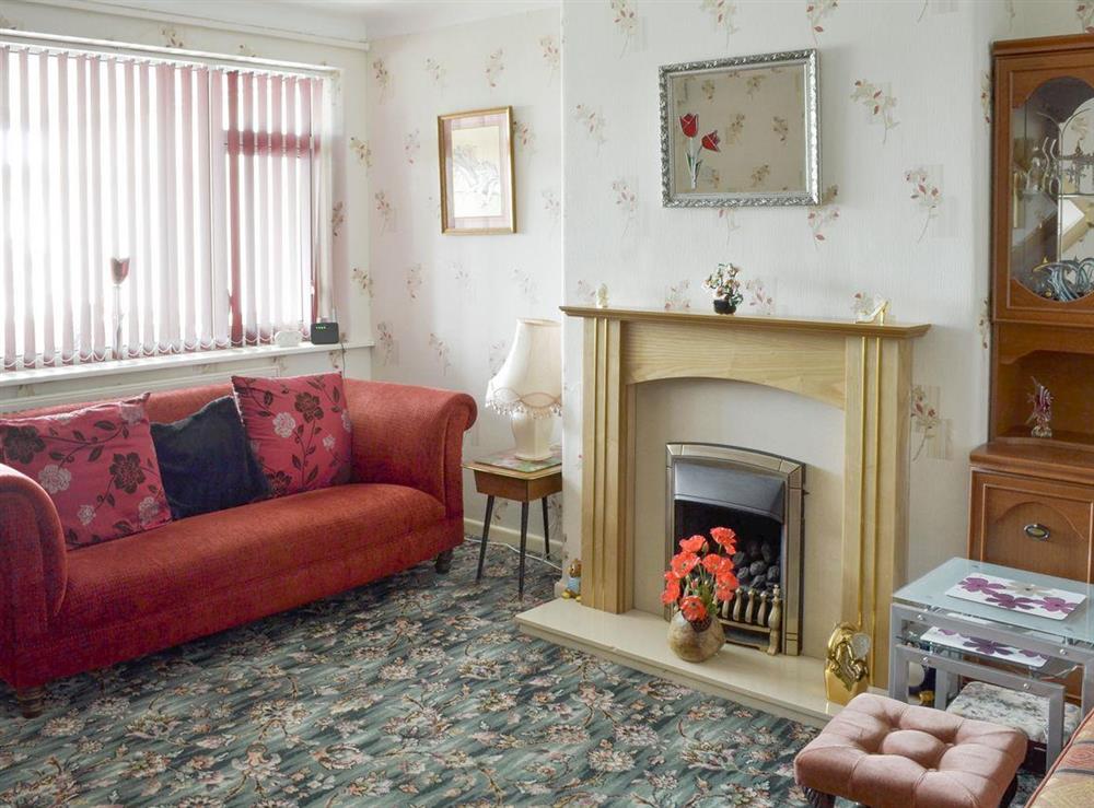 Welcoming living room at Rossall Beach Cottage in Rossall, near Thornton-Cleveleys, Lancashire, England