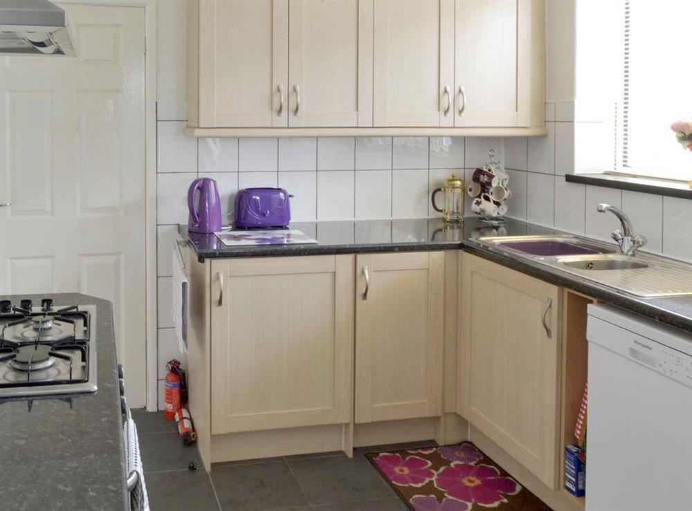 Well-equipped kitchen at Rossall Beach Cottage in Rossall, near Thornton-Cleveleys, Lancashire, England