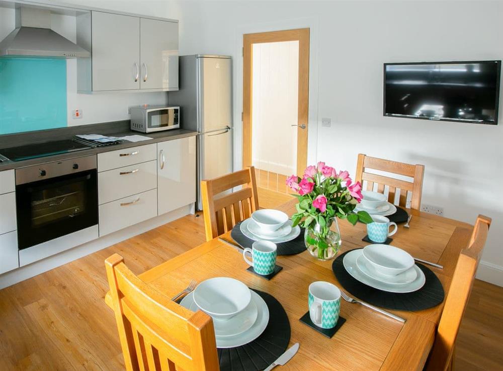 Fully fitted kitchen with dining area at Rossie Cottage in Auchterarder, near Gleneagles Village, Perthshire